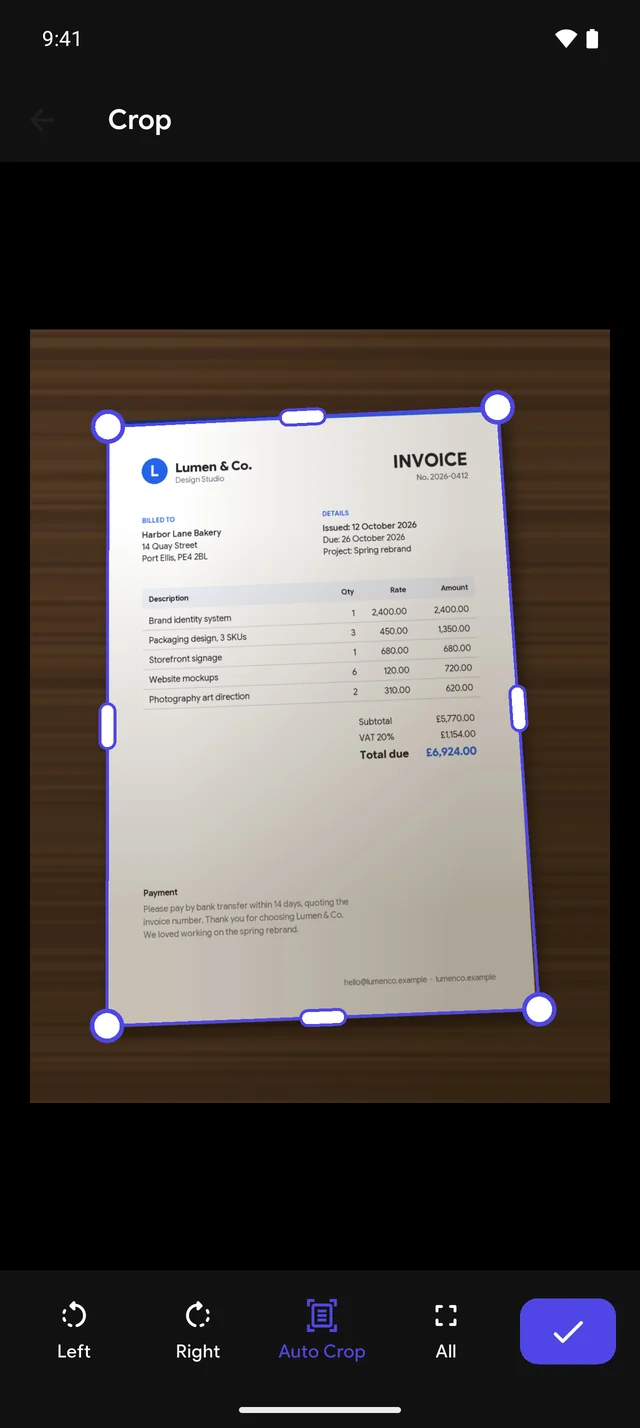 DocSensei crop screen with the invoice's edges detected automatically